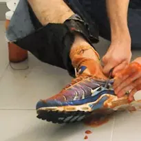 messy and destroyed Nike tn and jeans